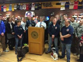 County Executive Bellone Opens Registration to the Public at the Sayville Running Company along side veterans and members of the running community. Photo Credit: Suffolk County.